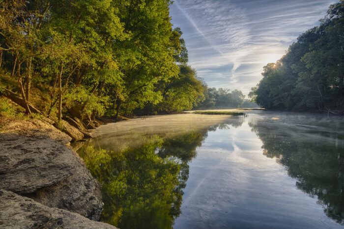 Late summer sun illuminates a bank along Tennessee's Duck river.