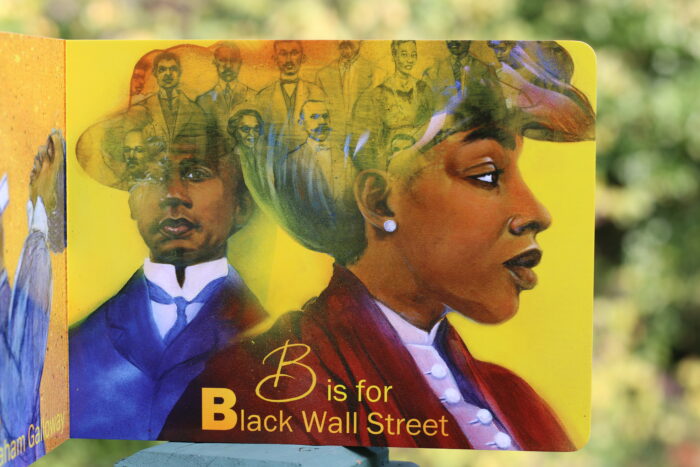 Choldrens book cover shows two women in 18th century dress with the words B is for Black Wall Street.